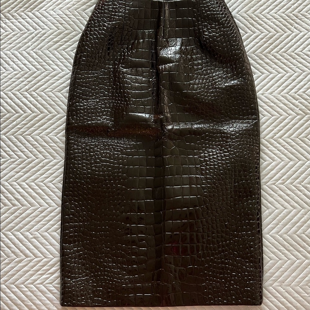 Versace leather knee skirt. Fits perfect for skinny girls. No sign of wear